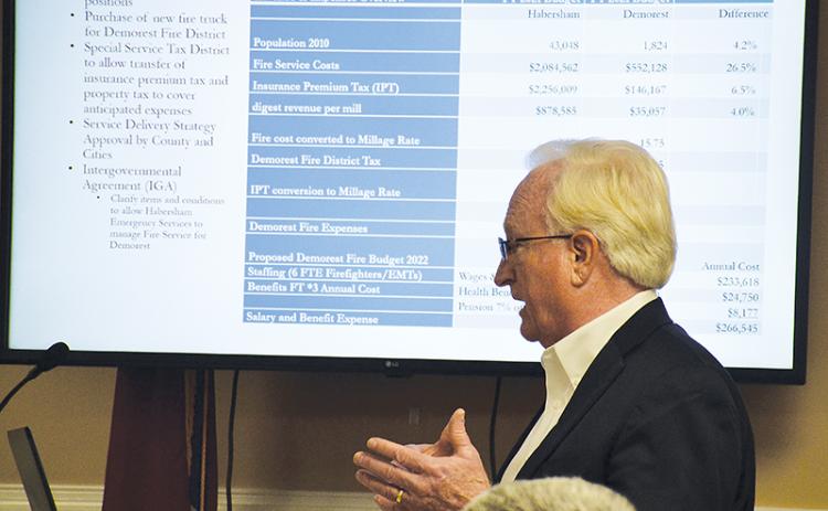 Habersham County Manager Phil Sutton talks to the Demorest City Council about the possibility of merging fire protection services.