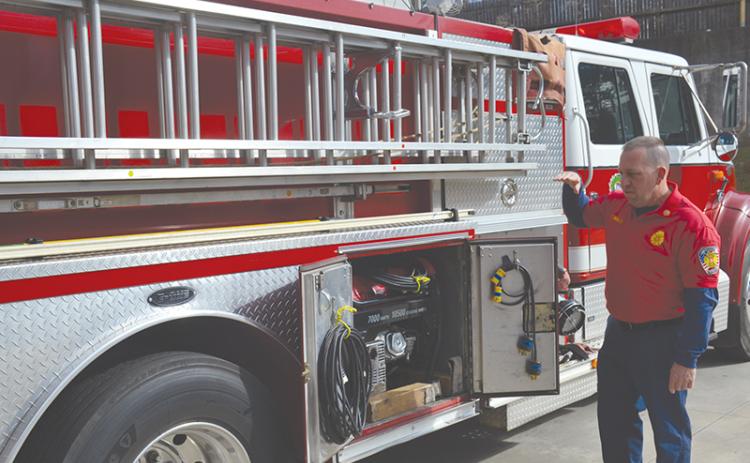 Demorest Fire Chief Ken Ranalli explains the ins and outs of his current ladder truck.