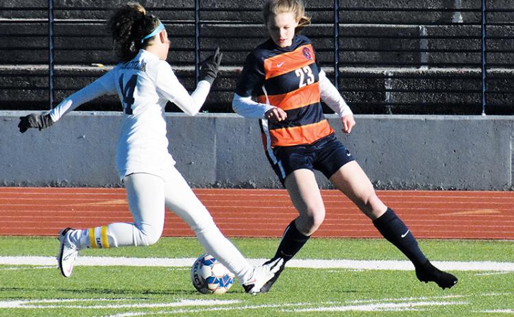 Habersham Central’s Sarah Clark evades a defender during an earlier home game.