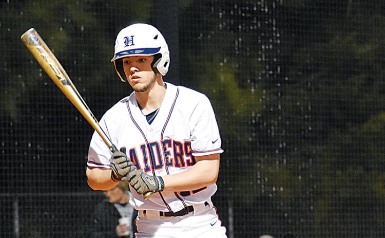 Trevor Stevens looks for the signs during a turn at-bat during Monday’s game. CODY ROGERS/Staff