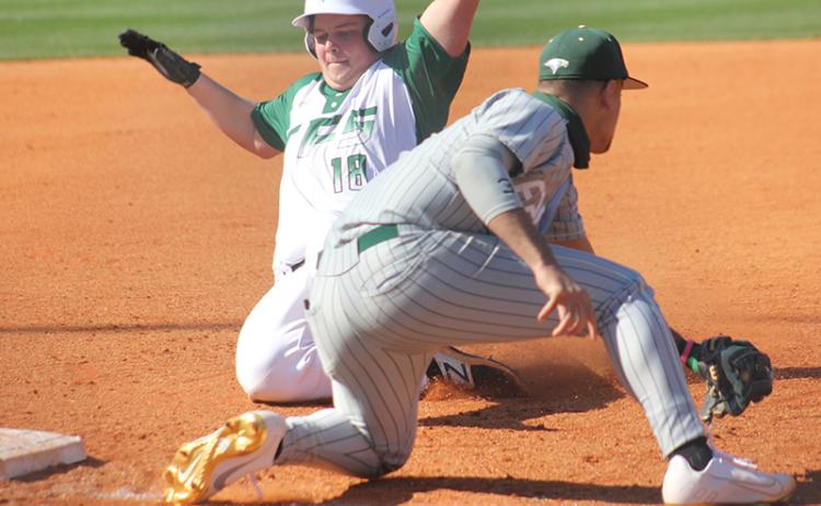 Tallulah Falls’ Aiden Gragg barely beats the tag of Rabun Gap third baseman Sabien Rivera.