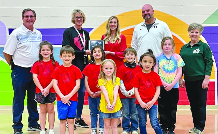 Demorest Elementary School students who raised $500 or more include (front row, from left) Charlie Hastie, Amelia Quaife and Aubrey Davis. Middle row are (from left) Helena Hastie, Olivia Holbrook, A.J. Beach and Braelin Sipes. Back row are (from left) David Gailer (Asst. Principal at DES), Erna Dowdy (P.E. Teacher at DES), Holly Marbut (Youth Market Director, American Heart Association), Superintendent Matthew Cooper and Demorest Principal Connie Yearwood.