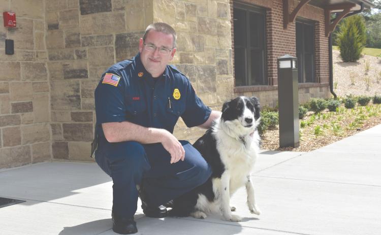 Cornelia Fire Marshal Josh Hazle and his dog Chloe have been working together at the fire department for four years.