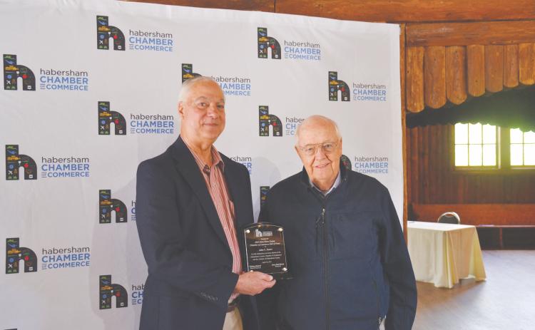 Habersham County Chamber of Commerce Hall of Fame inductee John Foster (right) is presented his award by Joey Duncan.
