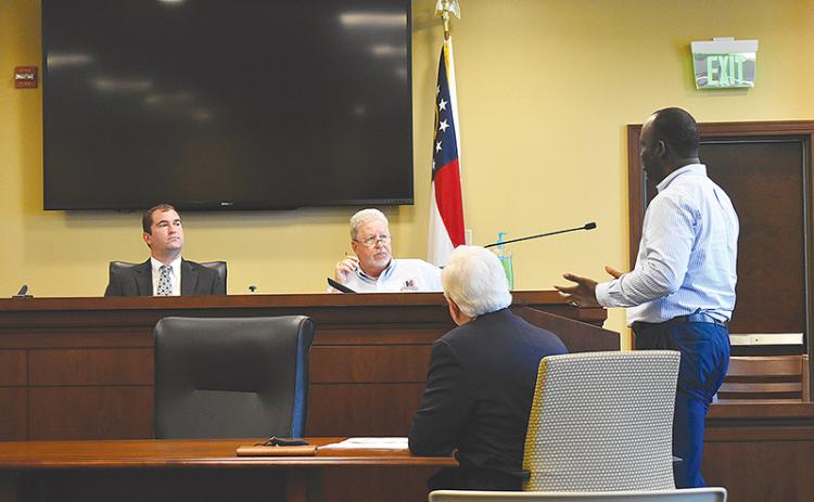 On Monday, Michael Baker International Project Manager Charles Adeogon, far right, discussed with the Habersham  Airport Commission how the price of steel is affecting its T-Hangar project. Airport commissioner Christopher Limbach, chairman Ken Schubring and County Manager Phil Sutton listen in.