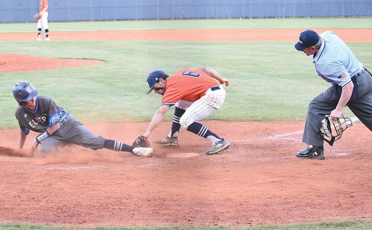 Habersham Central’s Azzi Cervantes puts down a tag on an Elbert County runner looking to score on a wild pitch in the  Raiders 11-3 loss to Elbert County on Monday night.