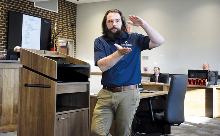 Carter & Sloope Grant Writer Gabe Morris explains more details about the 2021 Community Development Block Grant (CDBG) program during a preliminary hearing on Tuesday.