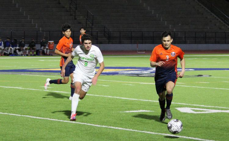 Habersham Central’s Angel Zavala gets past a Buford defender during an earlier home game. ISAIAH SMITH/Staff