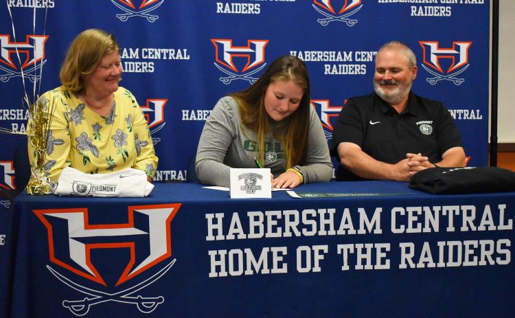 Selah Anderson signed her national letter of intent with Piedmont University Wednesday afternoon. Anderson won the Area 2-6A title last month and will compete in the state tournament with the Lady Raiders Monday and Tuesday. ISAIAH SMITH/Staff