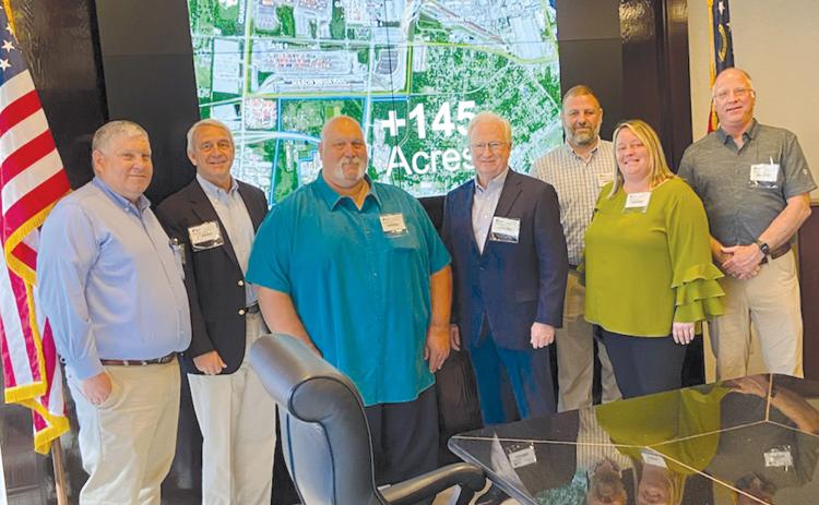 A contingent of Habersham County officials visited the port in Savannah on Friday, including (from left) Habersham County Planning Director Mike Beecham, Partnership Habersham Executive Director Charlie Fiveash, Commissioner Bruce Palmer, County Manager Phil Sutton, Baldwin City Council members Martin and Alice Venter and Georgia Power’s Brent Edwards. SUBMITTED