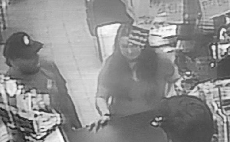 Jaylei Smith is seen at the Westside BP gas station in Clarkesville on May 10 with a man believed to be Devon Lovegrove, formerly a city resident. NCMEC/ Submitted