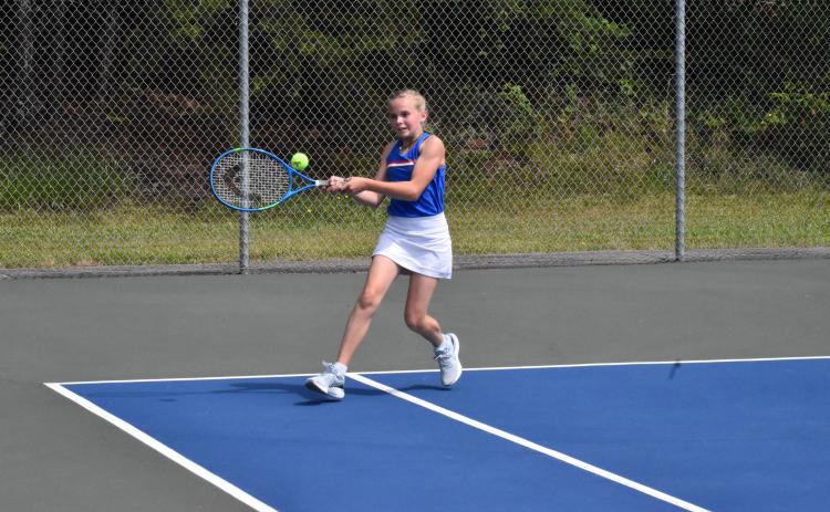 Abigail Brenner returns a shot Wednesday morning during Tallulah Falls’ tennis camp. ISAIAH SMITH/Staff