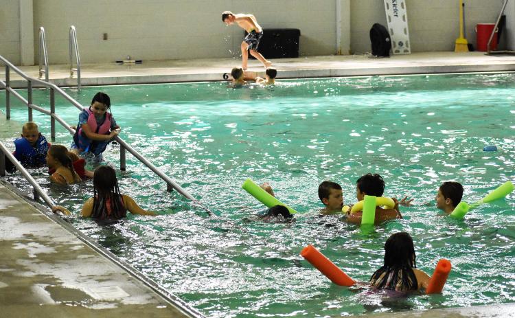 Campers enjoy a day in the pool Tuesday at the Ruby Fulbright Aquatic Center. ISAIAH SMITH/Staff