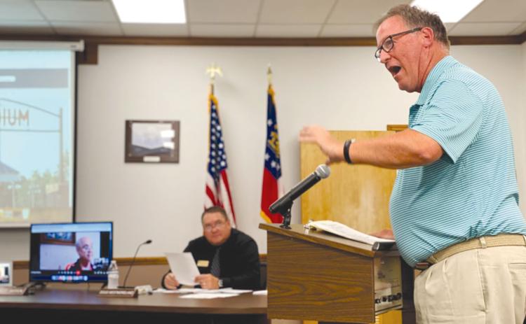 Habersham County Schools Athletic Director Geep Cunningham presents a year-in-review to the school board on Monday. CHAMIAN CRUZ/Staff