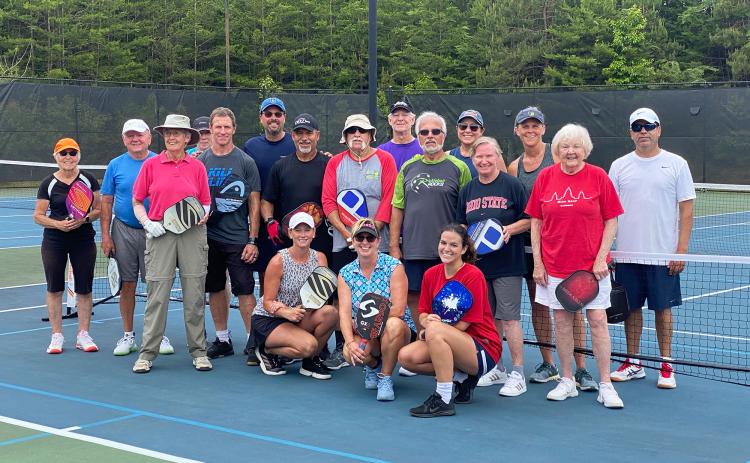 Since it began six years ago, the Habersham County Pickleball Club meets multiple times each week at the Aquatic Center tennis courts to play pickup games. Participants range in age from their teens to mid-80s, and many say the atmosphere of fun, inclusivity and community keep them coming out to play. ISAIAH SMITH/Staff