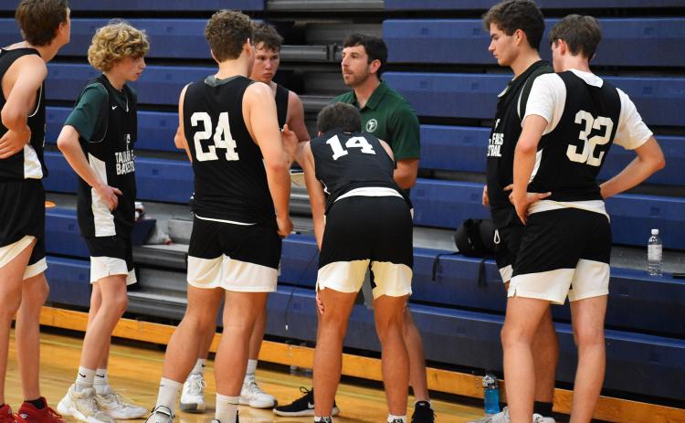 Tallulah Falls head coach Cody Coleman looks to rally his team during a timeout last week. ISAIAH SMITH/Staff