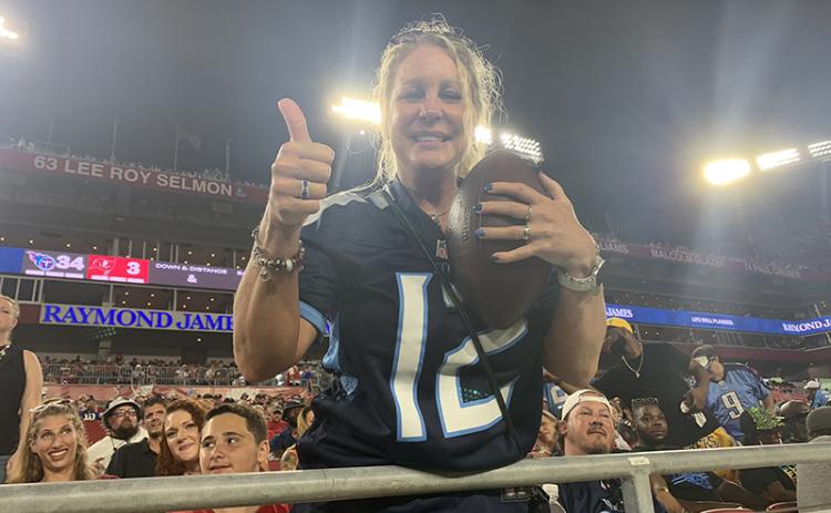 Janet Kinsey got a special treat from her son at the Tampa Bay game – the ball from his first professional touchdown. Photo by CORY CURTIS/Special