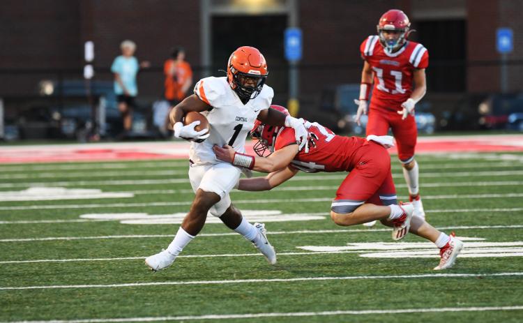 Habersham Central’s Simarcus Burney sheds a tackler during last week’s opener against Madison County. TOM ASKEW/Special