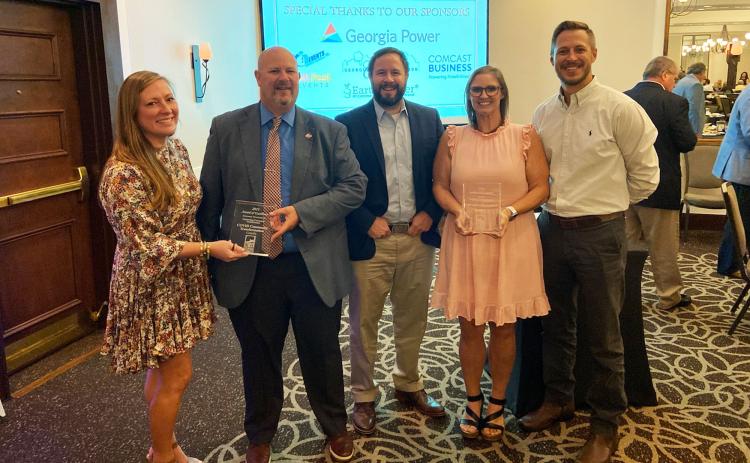Cornelia representatives (from left) Emily Herrin, Donald Anderson, John Borrow, Jessie Owensby and Heath Barrett celebrate the city’s awards at the Georgia Downtown Association (GDA) Conference. CHARLIE FIVEASH/Submitted