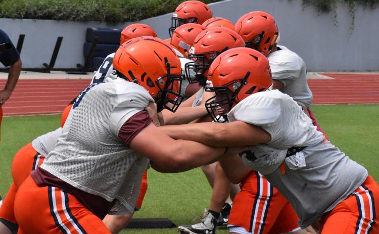 Habersham Central linemen mix it up Monday afternoon for the first time this season. MATTHEW OSBORNE/Staff