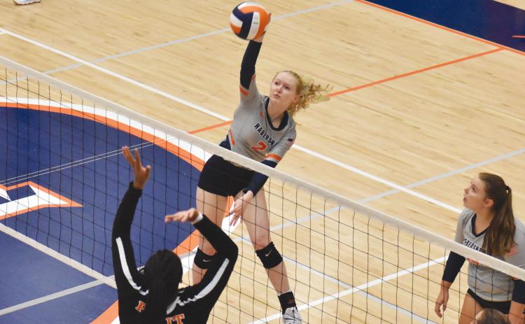 Habersham Central's Molly Butler goes for a kill during a game last season. FILE