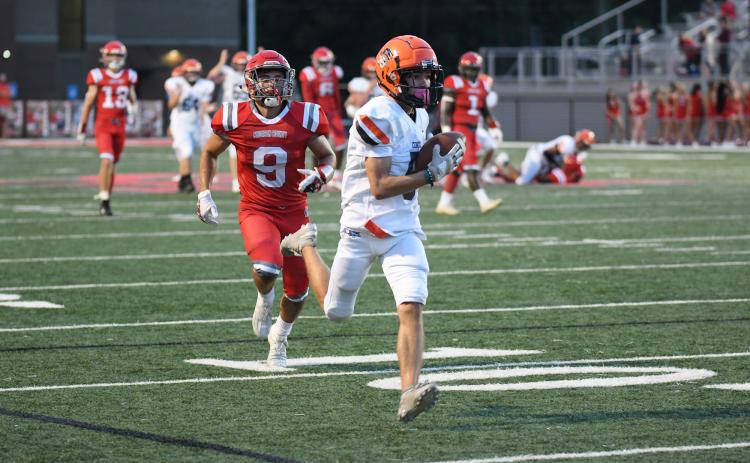 Habersham Central freshman Zeke Whittington gets behind the defense for a touchdown against Madison County on Friday night. TOM ASKEW/Special