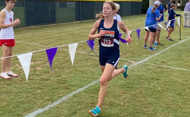 Habersham Central’s Audrey Hotard nears the finish line during Saturday’s meet in Athens. BRYANT ROCHE/Staff