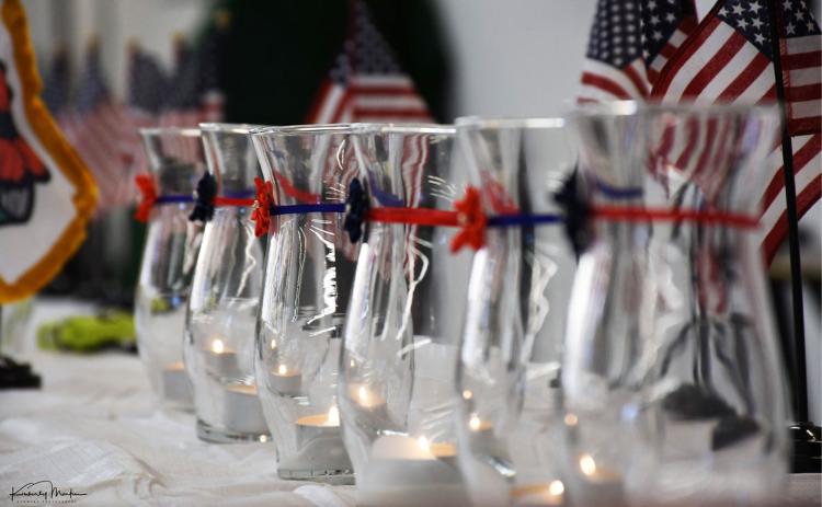 The displays included 13 candles (above) lit to remember the servicemen and women lost in the recent attack in Afghanistan. Photos courtesy of KIM MARTIN/Kimmers Photgraphy