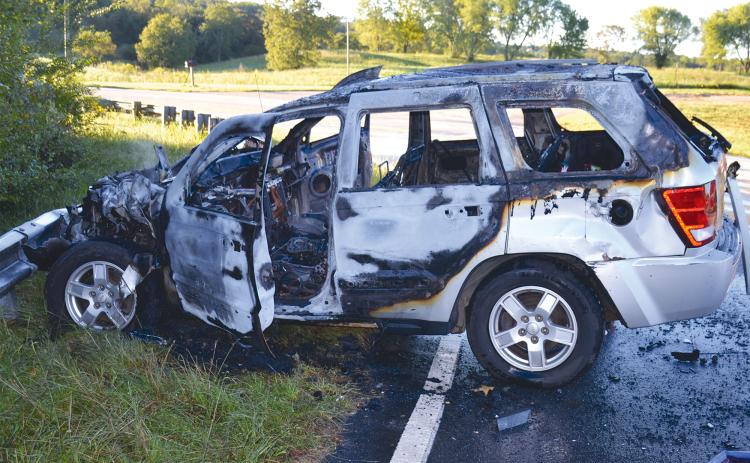 This Jeep Grand Cherokee burned after it caught on fire following a crash with a Habersham County Transit van on Thursday morning. MATTHEW OSBORNE/Staff