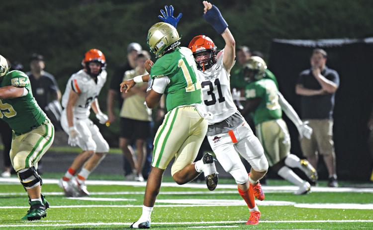 Habersham Central’s Braydon Wright looks to disrupt Buford’s quarterback during last Friday’s game. TOM ASKEW/Special