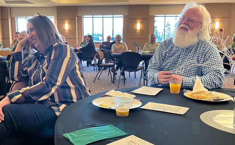 Billy Boyd and his wife Martha share a laugh during remarks at Boyd’s retirement breakfast Thursday morning at Habersham EMC headquarters. Boyd was the United Way Executive Director for the last seven years. MATTHEW OSBORNE/Staff