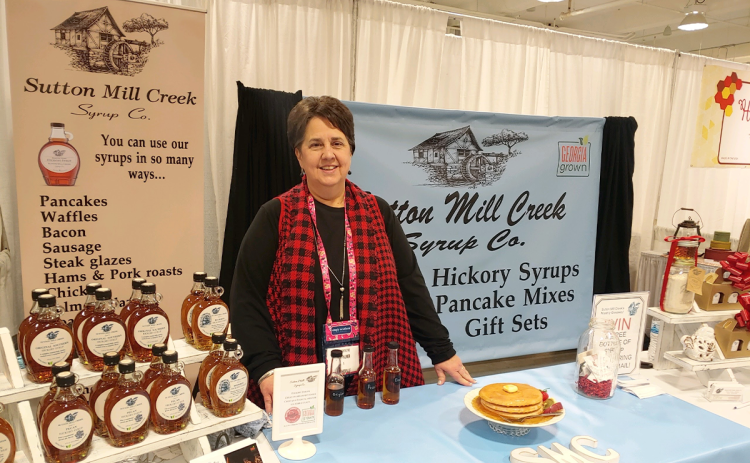 Beth Palmer displays her varieties of syrup at the Atlanta Market. BETH PALMER/Submitted
