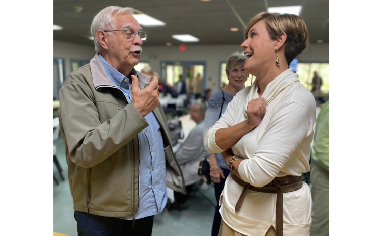 Habersham County Manager Alicia Vaughn (right) chats with James King at a recent event at the Senior Center. CAROLYN GIBSON/Submitted