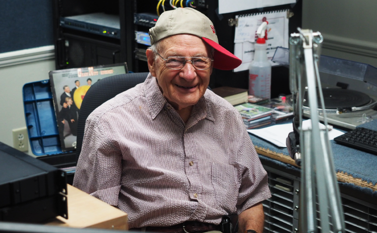 Billy Burrell, with his cap on sideways, poses in the WCON studio in 2015. Burrell liked to joke and “cut up” with fellow announcer, Kevin Croom. Burrell touched many lives through his decades on the radio in Habersham County. KEVIN CROOM/Submitted