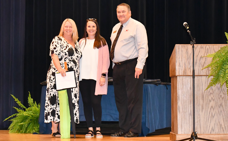 From left are Thompson, Ansley Kristy of Peach State Federal Credit Union and Westmoreland. ROWAN EDMONDS/Staff