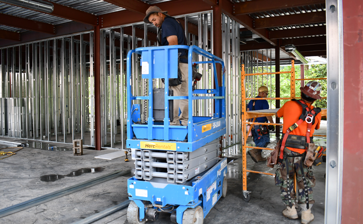 Crews work on HMC’s Habersham Home project, which was delayed by the COVID-19 pandemic. BRIAN WELLMEIER/Staff