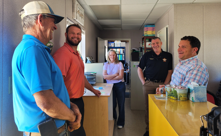 Tyler Harper, Georgia State Senator for District 7 and Republican nominee for state agriculture commissioner, speaks with  Ricky, Clint and Melinda James of Osage, as well as Rabun County Sheriff Chad Nichols and Georgia State Sen. Bo Hatchett of District 50. MEGAN BROOME/The Clayton Tribune