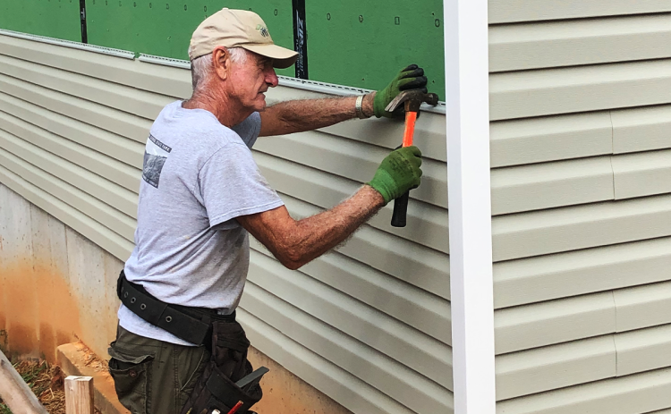 Jack Molnar works on a Habitat for Humanity house in Habersham County. NANETTE BAUGHMAN/Submitted