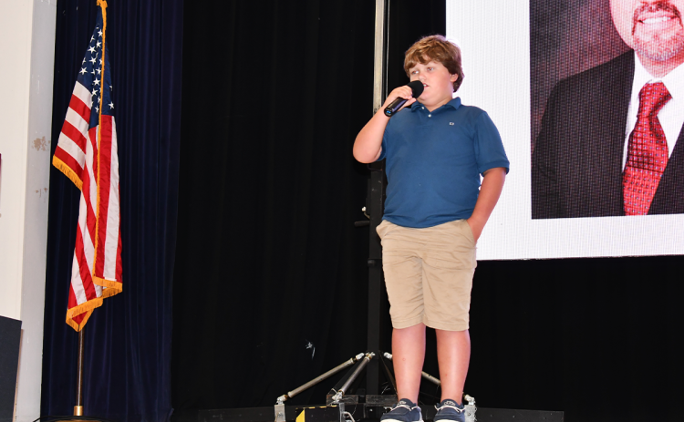Hank Bramlett sings “God Bless America” at the beginning of the Habersham EMC business meeting Thursday night. Hank is the son of Josh and Jade Bramlett and grandson of HEMC Board Member, Jeff Herrin. MATTHEW OSBORNE/Staff