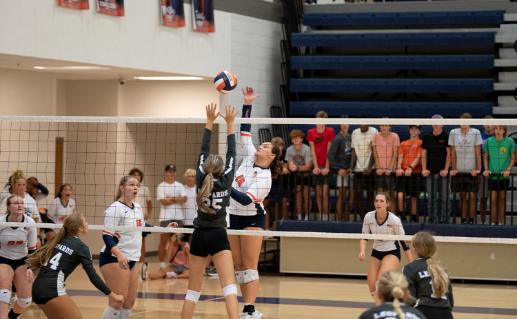 After a long volley, Habersham Central’s Callyn Chitwood knocks down the final spike during the Lady Raiders’ win over Banks County on Aug. 11. Habersham played again Tuesday night on the road. ZACH TAYLOR/Special