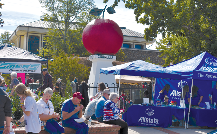 Folks enjoy last year’s Big Red Apple Festival in Cornelia after it returned from the COVID-19 shutdown. That event was big, but this year’s version is looking even bigger. FILE