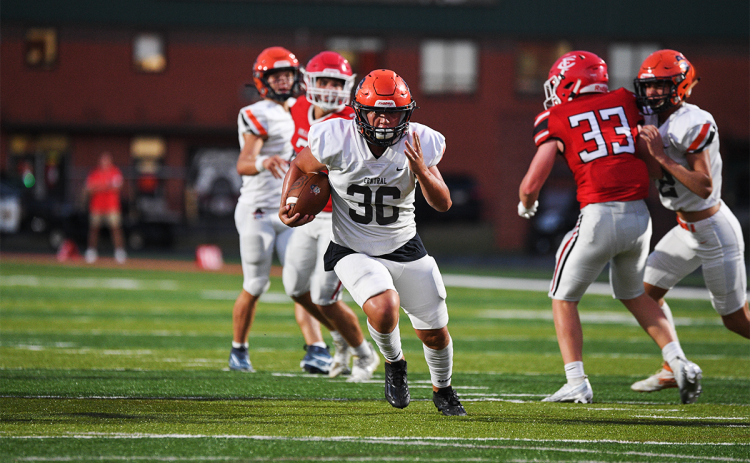 Habersham Central’s Hayes Gunn runs through a truck-sized hole Friday night on the way to a big gain against Forsyth Central. TOM ASKEW/Special