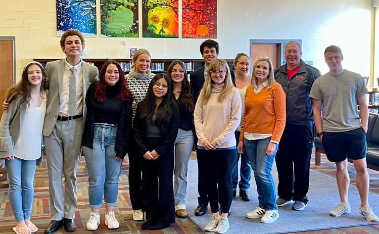 Participants in the 2021-2022 Mock Trial Team smile at the Regional Competition. Pictured are (Left to Right) Autumn Smith, Juan Borge Osorio, Sara Jones, Ella Kovalchik, Brina Diaz, Ella Reynolds, Smith Caudell, Sarah Carbo, Alison Singer, Tricia Hise, Rabun Kimzey, and Alex Godoy.  TRICIA HISE/Submitted