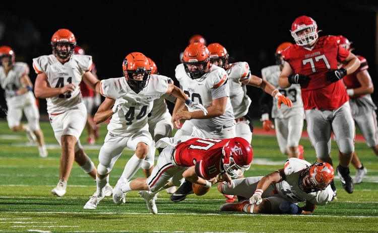 Habersham Central’s Caleb Blackburn (44) and Keller Green (13) surround Forsyth Central quarterback Brady Smith as they force him to fumble during Friday night’s game. TOM ASKEW/Special