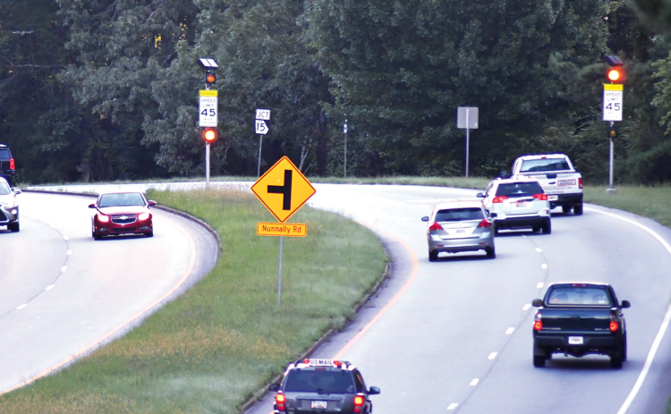 Traffic travels in both directions on Highway 441 through the Tallulah Falls school zone Tuesday morning. ENOCH AUTRY/The Clayton Tribune
