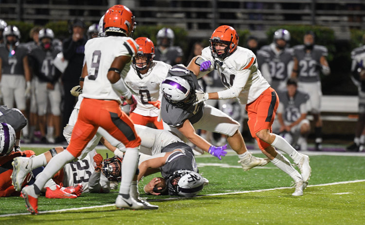 Habersham Central’s Caleb Blackburn knocks a North Forsyth blocker off his feet during Friday night’s game. TOM ASKEW/Special