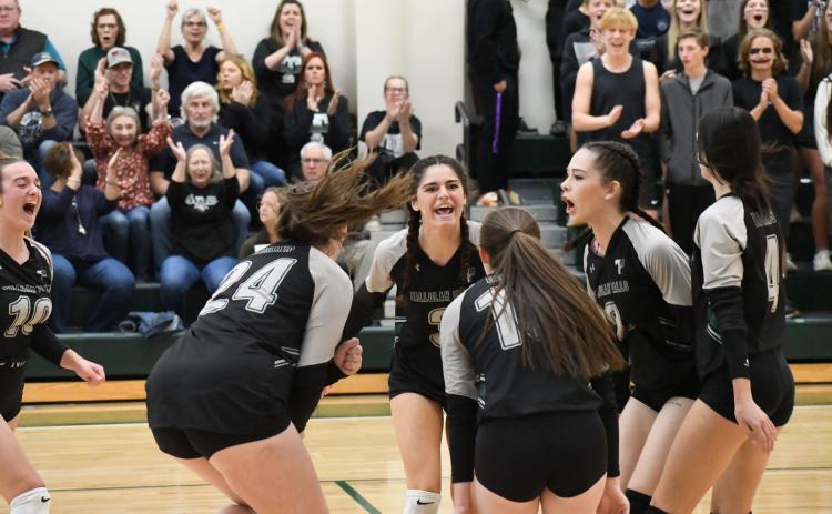 Tallulah Falls players celebrate a point on Saturday against Mt. Pisgah. From left are Kitty Rodenas (running in), Addy McCoy, Chloe Kahwach, Sarah Jennings, Elsa Sanchez and Rebecca Heyl. MATTHEW OSBORNE/Staff