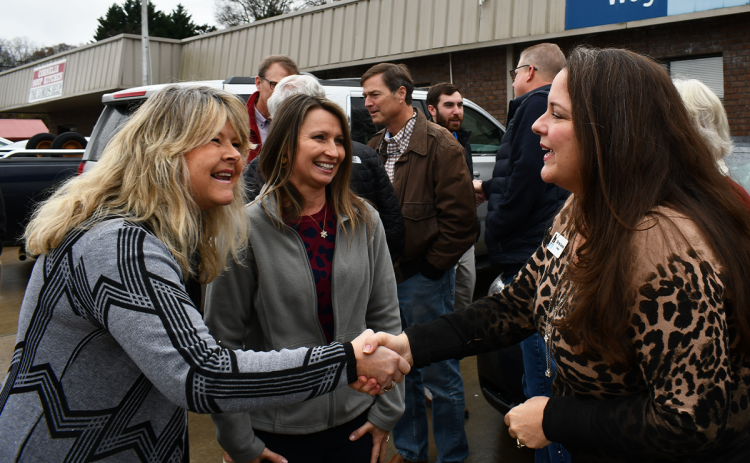 From left, Vicky Frankum of Habersham County United Way and Leslie Foster of Habersham Chamber of Commerce speak with new Chamber president Ellie Van Doornum outside of Habersham County United Way on Monday. JOHN DILLS/Staff