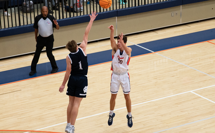 Habersham Central’s Cole Gary scores 3 from well beyond the arc, setting the Raiders ahead by four. ZACH TAYLOR/Special