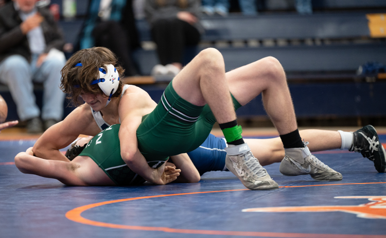 Westin Lakey secures the first pin for Habersham Central in their match against North Hall. ZACH TAYLOR/Special